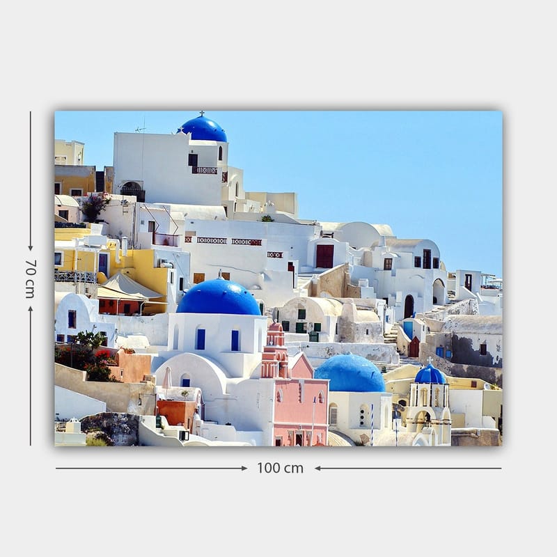 Lerretsbilde 70x100 cm - Vakker utsikt over de karakteristiske hvite husene og blå kuplene på Santorini - Blå / Hvit / Rosa - Innredning - Bilder & kunst - Lerretsbilder