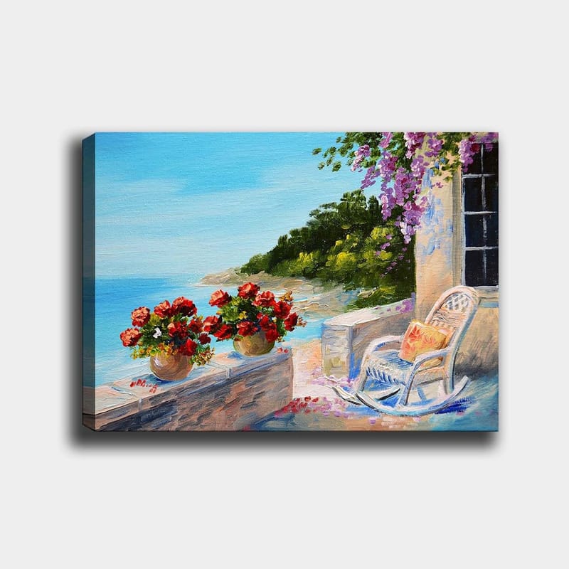 Lerretsbilde 70x100 cm - Vakker utsikt over havet med blomster i potter og en stol på en terrasse, Blå / Grønn / Rød