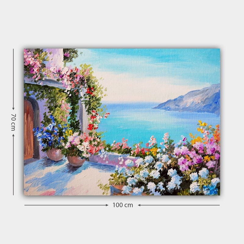 Lerretsbilde 70x100 cm - Vakker utsikt over havet med blomsteroppsatser i potter som pryder en terrasse - Blå / Grønn / Rosa - Innredning - Bilder & kunst - Lerretsbilder