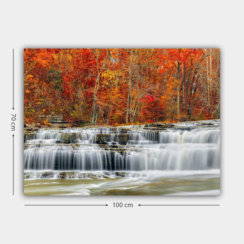Lerretsbilde 70x100 cm - Vakkert fossefall omgitt av høstfarger i røde og oransje nyanser - Rød / Oransje / Grå - Innredning - Bilder & kunst - Lerretsbilder