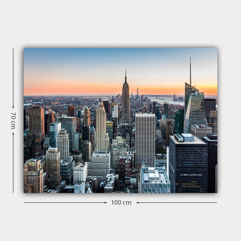 Lerretsbilde 70x100 cm - Panoramautsikt over New York City med ikoniske skyskrapere i solnedgangens lys - Blå / Grå / Oransje - Innredning - Bilder & kunst - Lerretsbilder