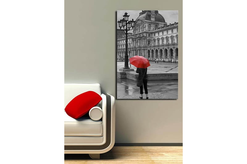 Lerretsbilde 70x100 cm - Person som står med en rød paraply i et regnfullt bymiljø foran en historisk bygning - Rød / Svart - Innredning - Bilder & kunst - Lerretsbilder