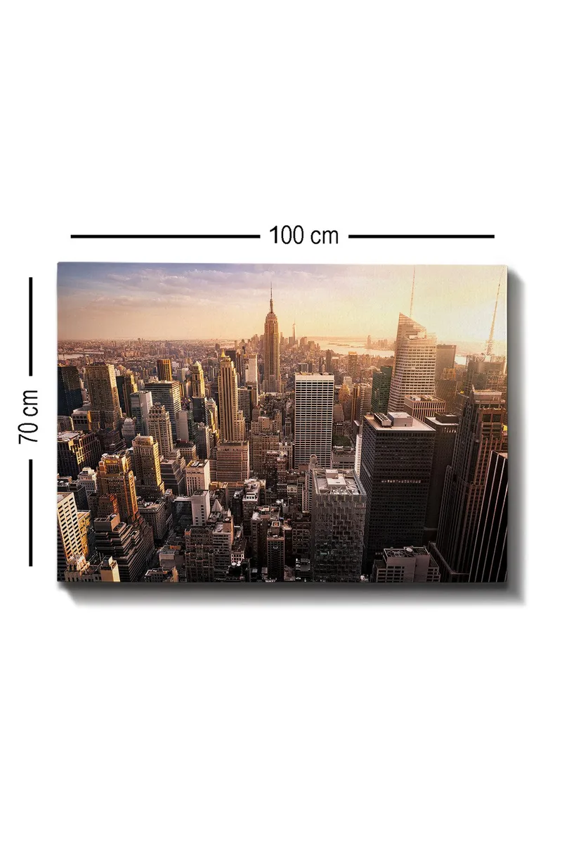 Lerretsbilde 70x100 cm - Panoramautsikt over en by med skyskrapere og den ikoniske Empire State Building ved solnedgang - Gull / Grå / Blå - Innredning - Bilder & kunst - Lerretsbilder