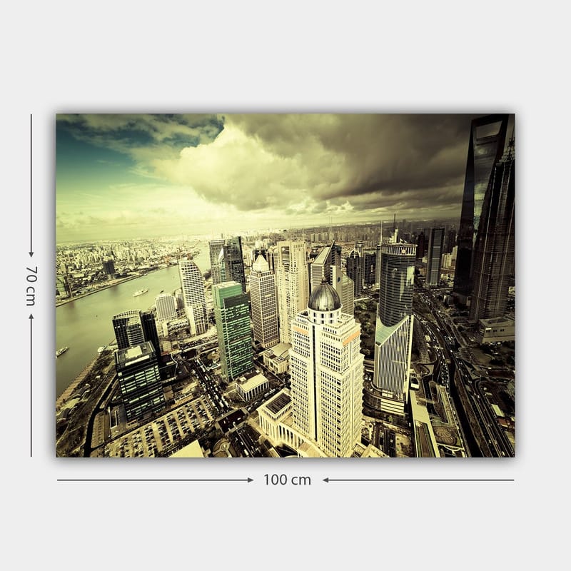 Lerretsbilde 70x100 cm - Panoramautsikt over en moderne by med høye skyskrapere og en elv som renner gjennom landskapet - Grønn / Grå / Beige - Innredning - Bilder & kunst - Lerretsbilder