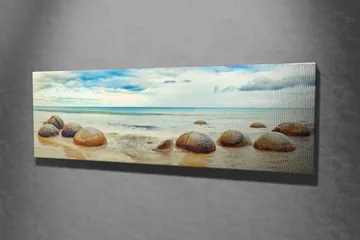 Lerretsbilde 80x30 cm - Runde steiner på en strand med hav og himmel i bakgrunnen - Blå / Beige / Grå - Innredning - Bilder & kunst - Lerretsbilder
