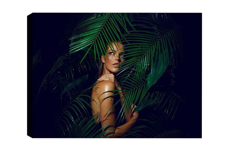 Lerretsbilde - Kvinne delvis skjult bak grønne palmeblader, Mørkegrønn / Hudtone / Svart