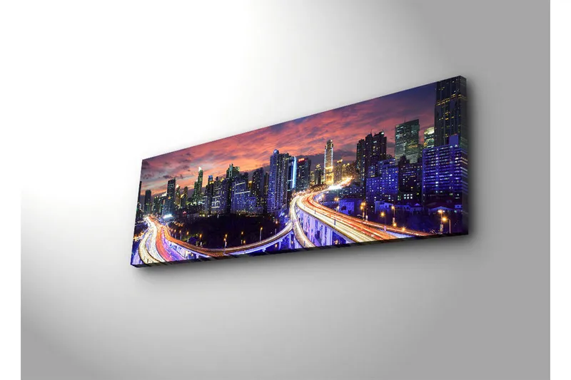 Lerretsbilde med LED-belysning 30x90 cm - Bysilhuett i skumringen med lysstråler fra veiene - Mørk blå / Oransje / Lilla - Innredning - Bilder & kunst - Lerretsbilder