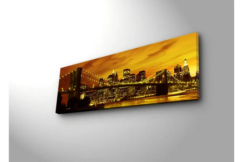 Lerretsbilde med LED-belysning 30x90 cm - Bysilhuett med bro i solnedgangens gylne lys - Gull / Svart / Oransje - Innredning - Bilder & kunst - Lerretsbilder