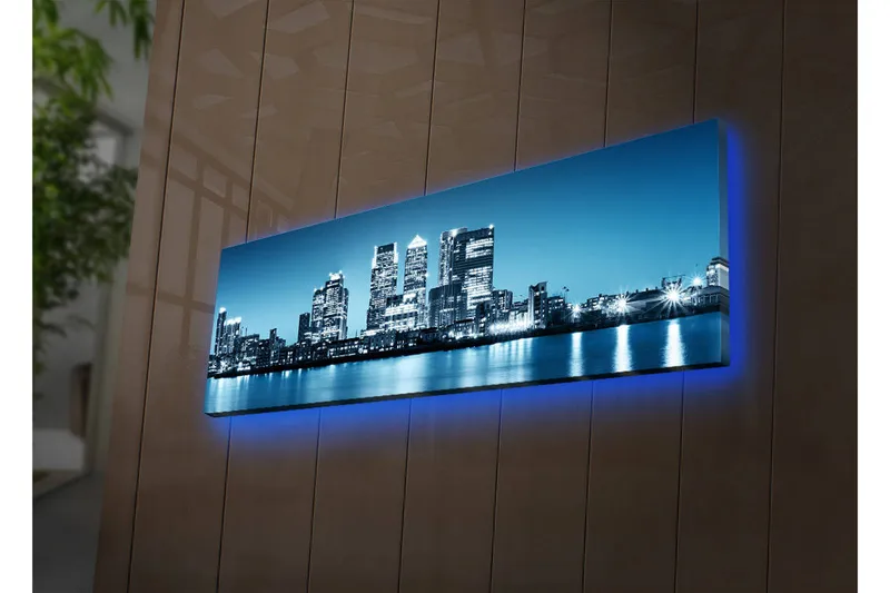 Lerretsbilde med LED-belysning 30x90 cm - Bysilhuett med moderne skyskrapere ved vannkanten, Blå / Svart / Hvit