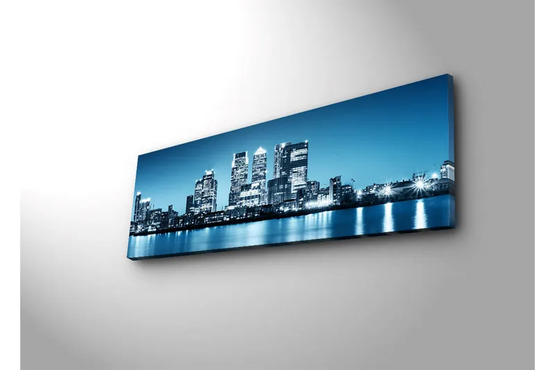 Lerretsbilde med LED-belysning 30x90 cm - Bysilhuett med moderne skyskrapere ved vannkanten - Blå / Svart / Hvit - Innredning - Bilder & kunst - Lerretsbilder