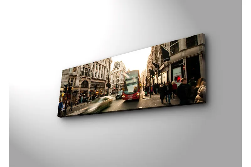 Lerretsbilde med LED-belysning 30x90 cm - Livlig bybilde med bevegelse og mennesker på en gate - Rød / Beige / Grønn - Innredning - Bilder & kunst - Lerretsbilder