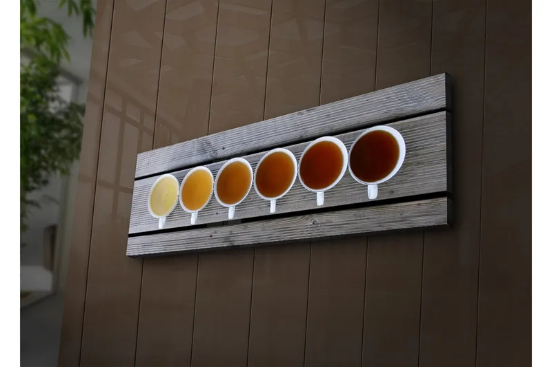 Lerretsbilde med LED-belysning 30x90 cm - Rekke med kaffekopper med forskjellige nyanser av drikke - Lys gul / Brun / Oransje - Innredning - Bilder & kunst - Lerretsbilder