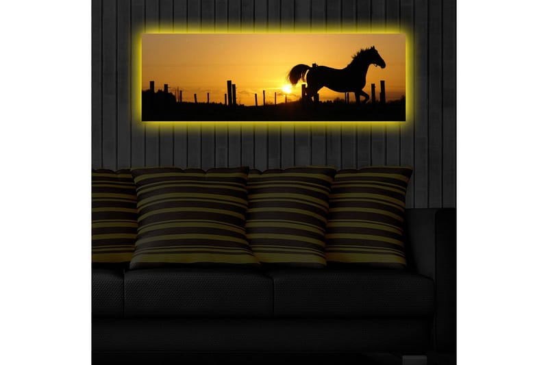 Lerretsbilde med LED-belysning 30x90 cm - Silhuett av en hest som galopperer ved solnedgang - Mørk brun / Oransje / Gul - Innredning - Bilder & kunst - Lerretsbilder