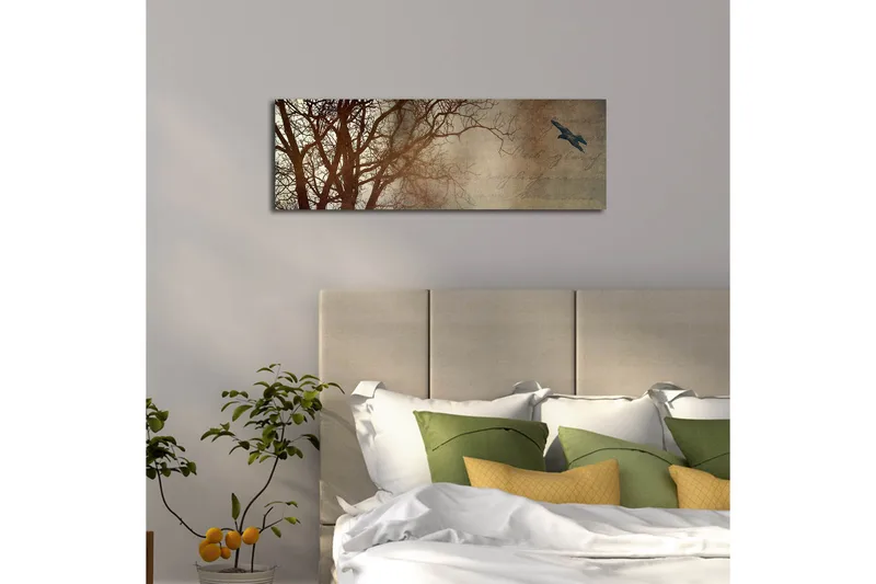 Lerretsbilde med LED-belysning 30x90 cm - Silhuett av et tre med en fugl i flukt mot en mykt tonet bakgrunn - Mørk brun / Beige / Svart - Innredning - Bilder & kunst - Lerretsbilder