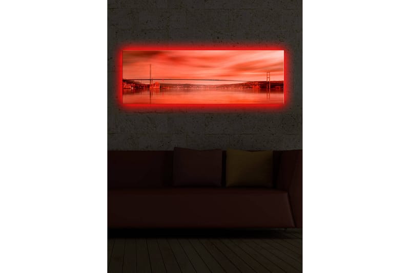 Lerretsbilde med LED-belysning 30x90 cm - Storslått utsikt over en bro over en speilblank vannflate i solnedgangens farger - Rød / Oransje / Svart - Innredning - Bilder & kunst - Lerretsbilder