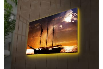Lerretsbilde med LED-belysning 45x70 cm - Seilbåt mot en solnedgang over havet - Oransje / Svart / Gull - Innredning - Bilder & kunst - Lerretsbilder