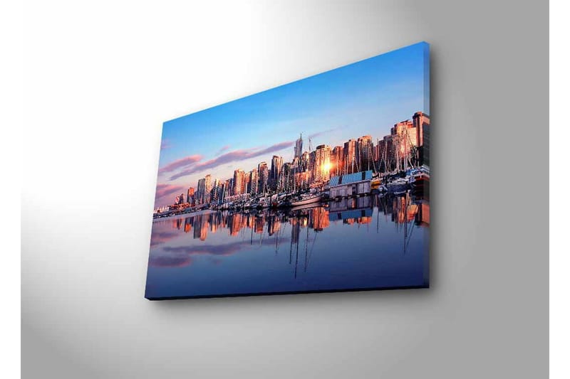 Lerretsbilde med LED-belysning - Bysilhuett ved solnedgang med refleksjoner i vannet - Blå / Oransje / Lilla - Innredning - Bilder & kunst - Lerretsbilder