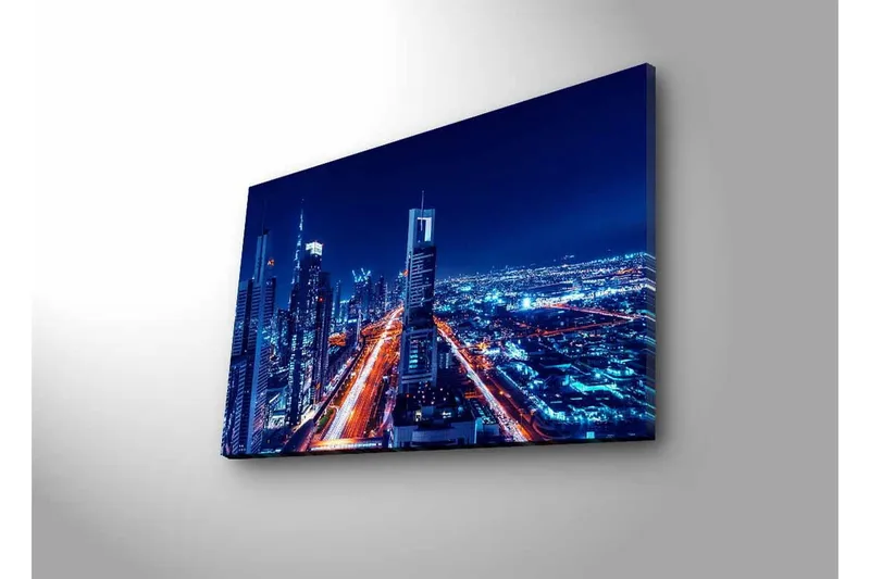 Lerretsbilde med LED-belysning - Nattlig bysilhuett med opplyste skyskrapere - Mørk blå / Lys oransje / Hvit - Innredning - Bilder & kunst - Lerretsbilder