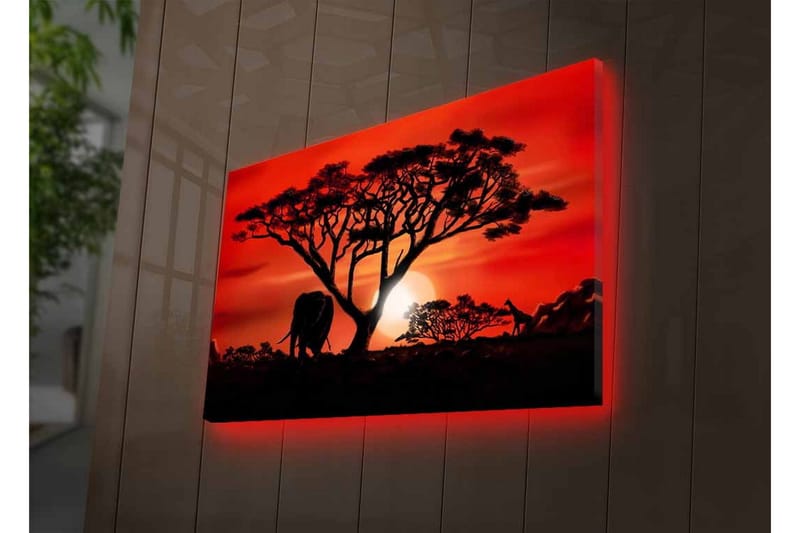 Lerretsbilde med LED-belysning - Silhuett av et tre med en elefant i solnedgangens lys - Rød / Svart / Oransje - Innredning - Bilder & kunst - Lerretsbilder