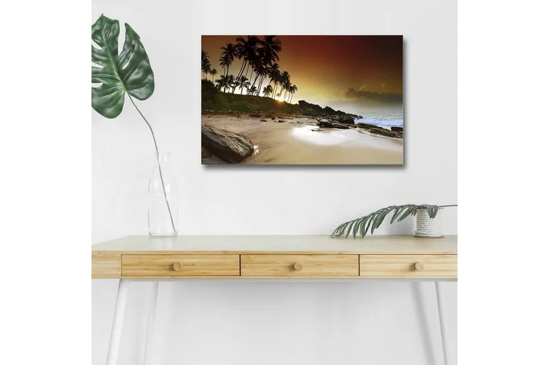 Lerretsbilde med LED-belysning - Solnedgang ved en tropisk strand med palmer og steiner, Mørk brun / Beige / Grønn
