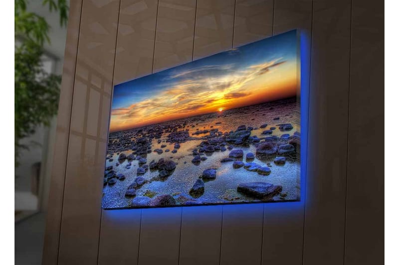 Lerretsbilde med LED-belysning - Storslått solnedgang over en steinete kystlinje - Mørk blå / Oransje / Lys blå - Innredning - Bilder & kunst - Lerretsbilder