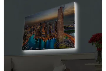 Lerretsbilde med LED-belysning - Storslått utsikt over en moderne by med glitrende skyskrapere og en svingete elv - Blå / Oransje / Grå - Innredning - Bilder & kunst - Lerretsbilder