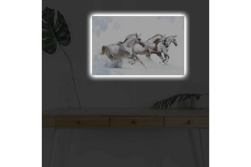 Lerretsbilde med LED-belysning - Tre hvite hester galopperer gjennom et snødekt landskap - Hvit / Lys grå / Blå - Innredning - Bilder & kunst - Lerretsbilder