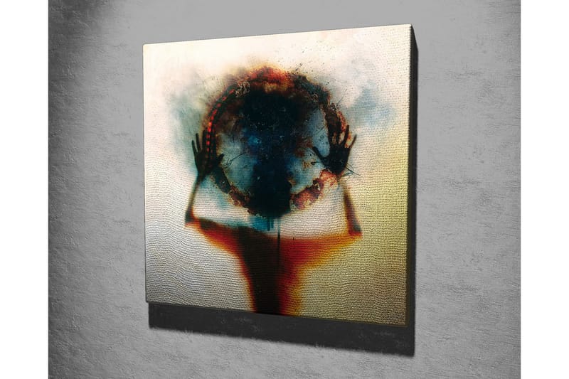 Lerretsbilde - Silhuett av en person som holder en sirkel av farger og lys - Svart / Blå / Rød - Innredning - Bilder & kunst - Lerretsbilder