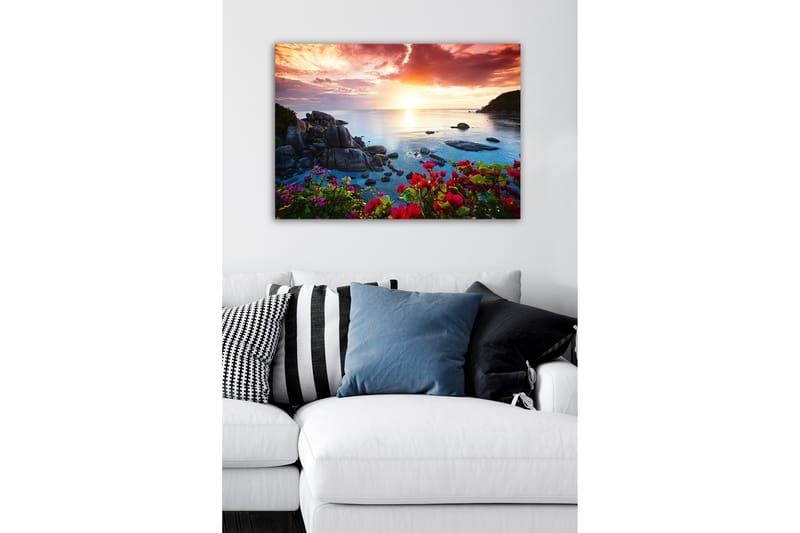 Lerretsbilde - Vakker solnedgang over havet med blomster i forgrunnen - Rosa / Blå / Oransje - Innredning - Bilder & kunst - Lerretsbilder