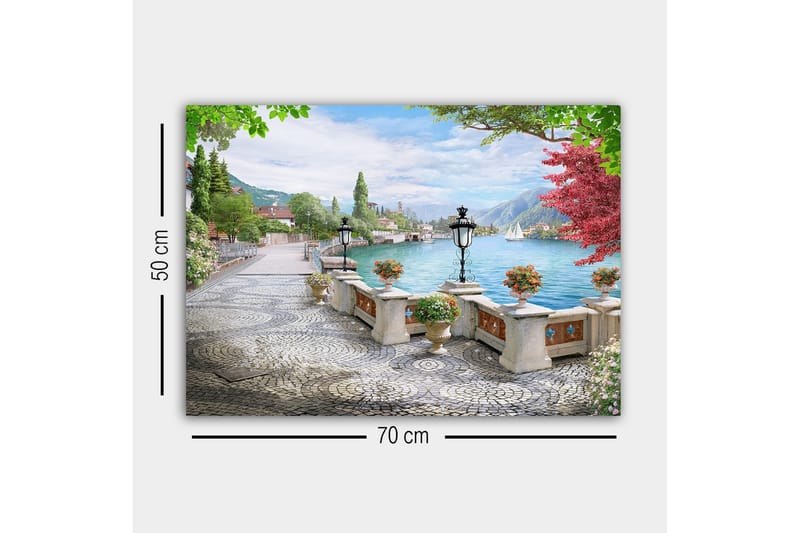 Lerretsbilde - Vakker utsikt over innsjøen med promenade og blomster i potter - Grønn / Blå / Rosa - Innredning - Bilder & kunst - Lerretsbilder