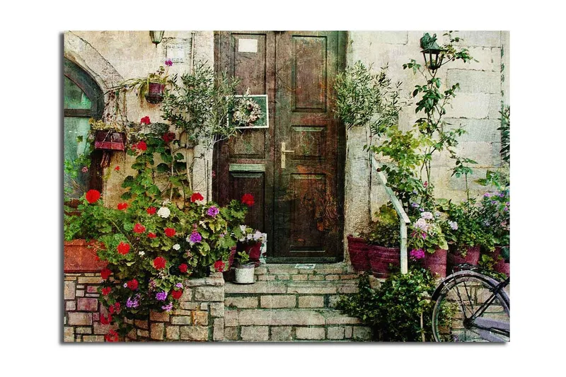 Stort lerretsbilde 100x70 cm - Vakker dør omgitt av fargerike blomster og grøntområder, Rød / Grønn / Lilla
