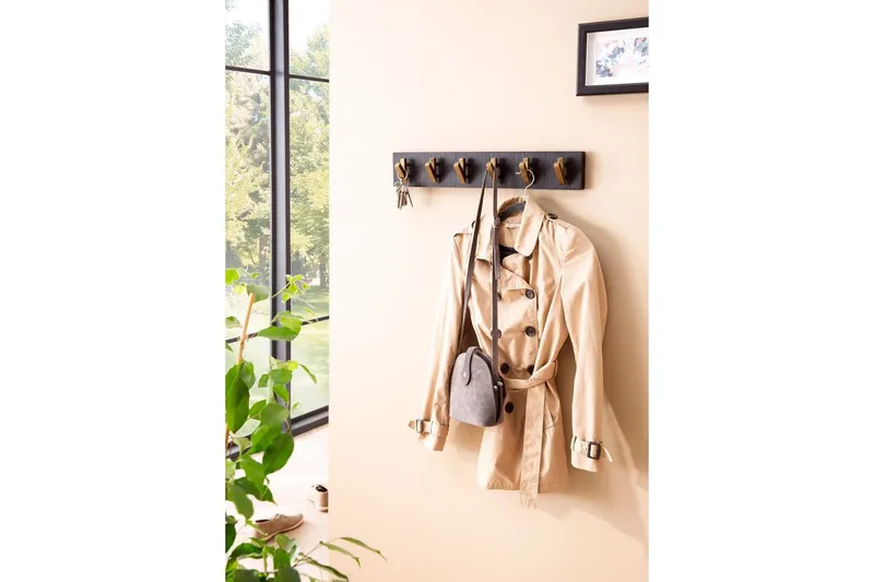 Garderobe Wohnling Vegghengt klesstativ 6 gylne metallkroker elegant i svart gull - Oppbevaring - Klesoppbevaring - Stumtjener